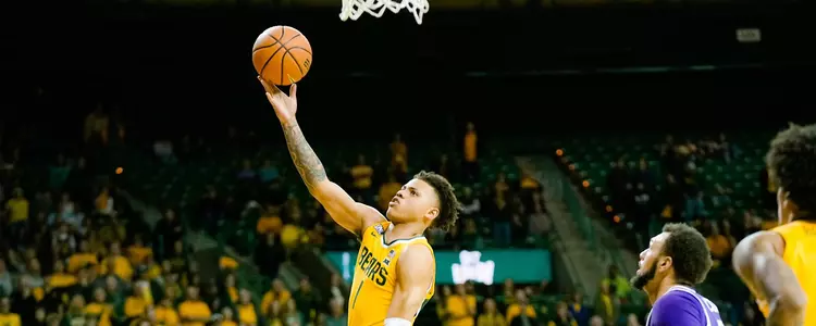Keyonte George goes for the layup against TCU