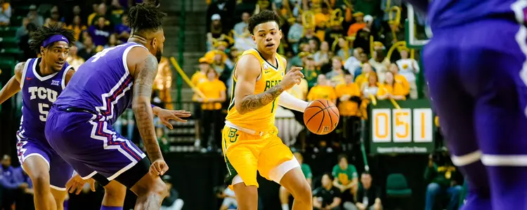 Keyonte George dribbles against TCU