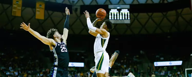 Keyonte George shoots against Kansas State