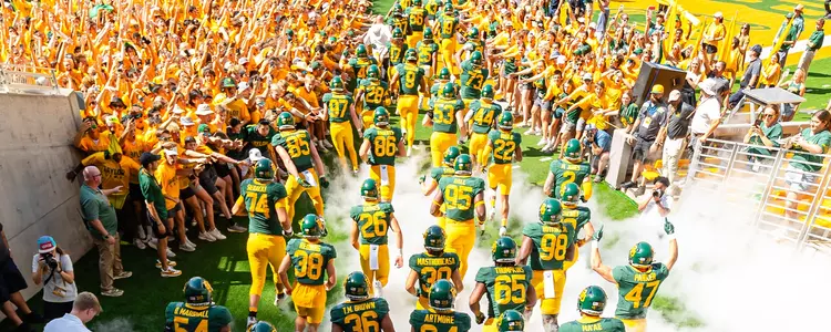 Football Runs Out of Tunnel vs Utah