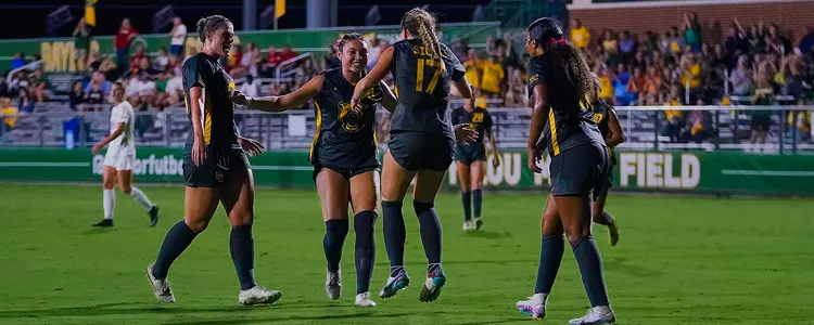Celebrating after a goal against Iowa State