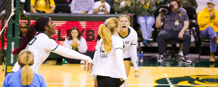 Allie Sczech and Manuela Bibinbe celebrate with Riley Simpson against TCU