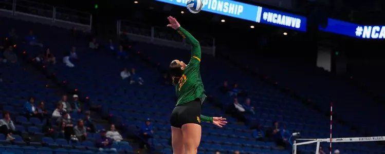 Elise McGhee serves against JMU in the first round of the NCAA Tournament