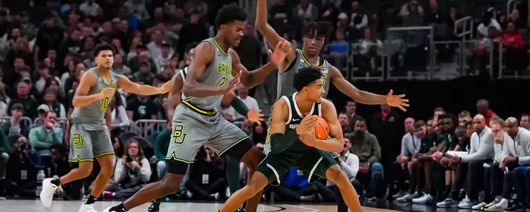 Yves and Ja'Kobe double team against Michigan State