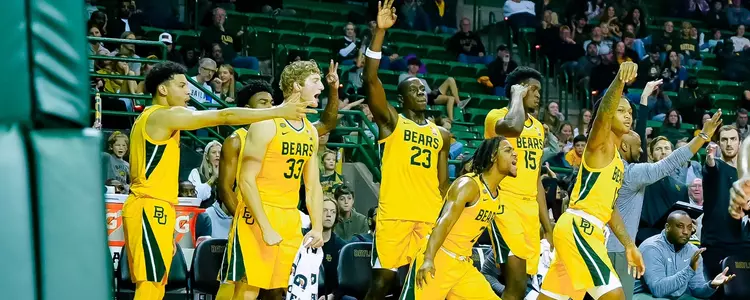MBB Bench Celebrates vs Northwestern State 2023