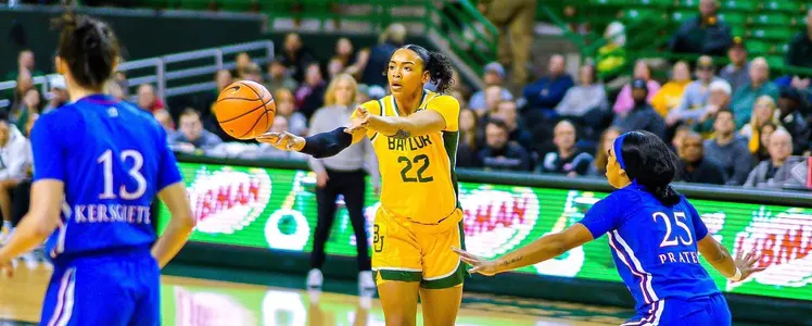 Fontleroy passes the ball against the Jayhawks