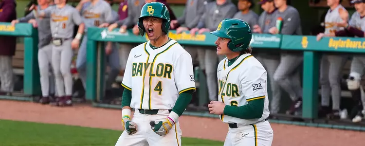 Kobe Andrade celebrates with Cole Posey after scoring a run