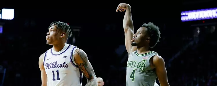 LJ Cryer shoots a three against Kansas State