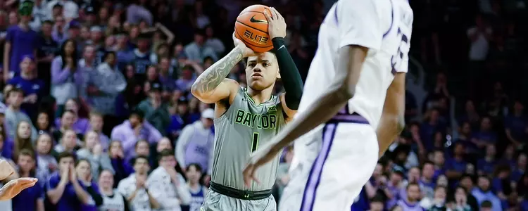 Keyonte George shoots a three against Kansas State