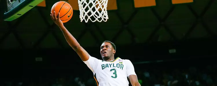 Dale Bonner goes for the layup against Texas