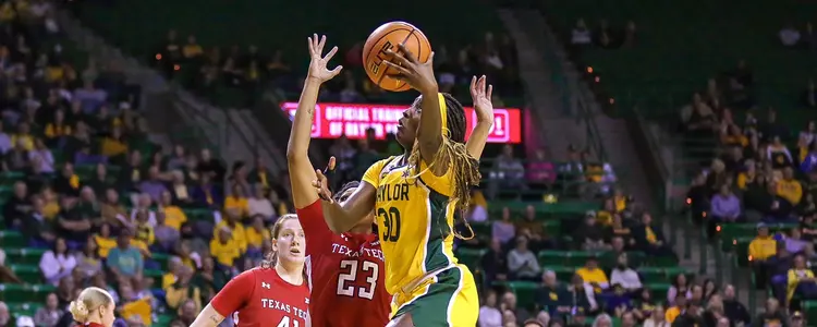 Catarina Ferreira goes for the layup against Texas Tech
