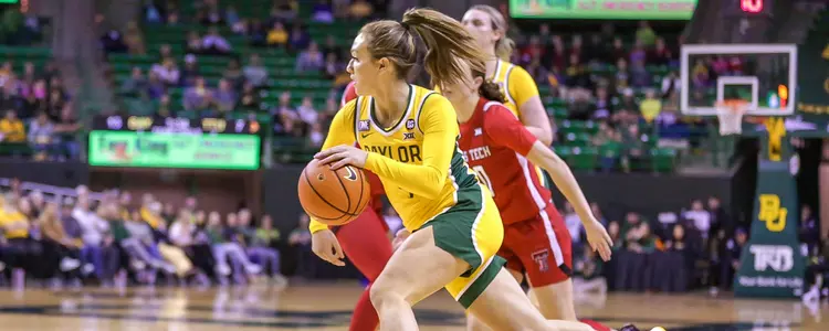 Jana van Gytenbeek dribbles against Texas Tech