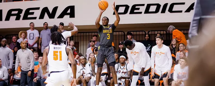 Dale Bonner shoots a 3-pointer against OSU