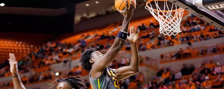 Jonathan Tchamwa Tchatchoua gets the layup against Oklahoma State