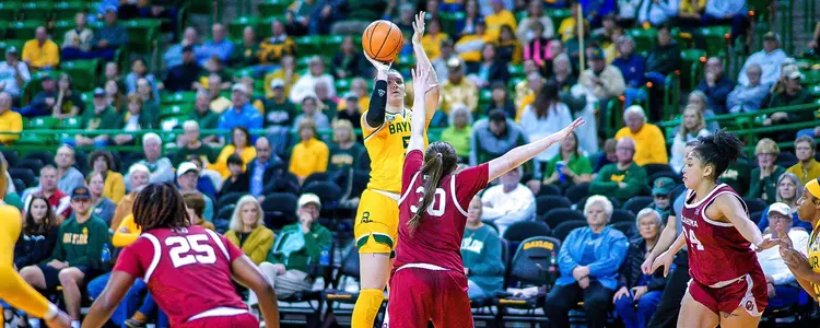 Caitlin Bickle shoots the three against OU