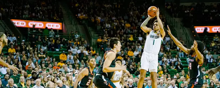 Keyonte George shoots the three pointer against Texas Tech