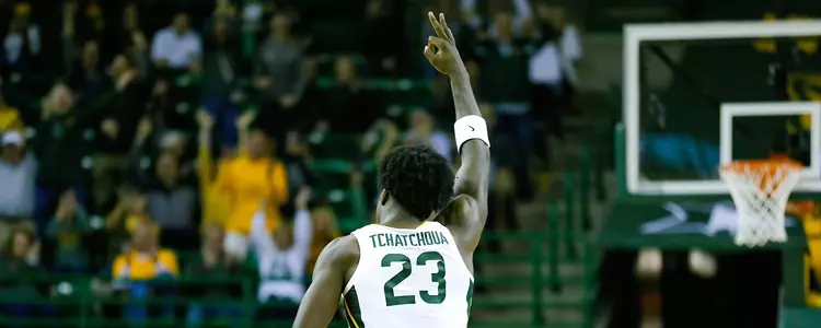 Jonathan Tchamwa Tchatchoua gets a three against Texas Tech