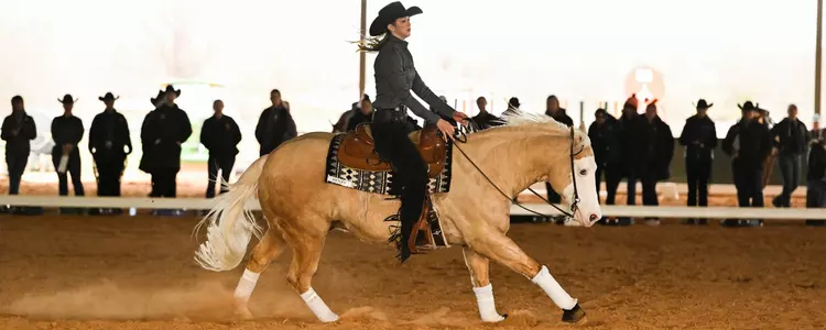 Madaline Callaway competes in a Reining ride against OSU in 2023