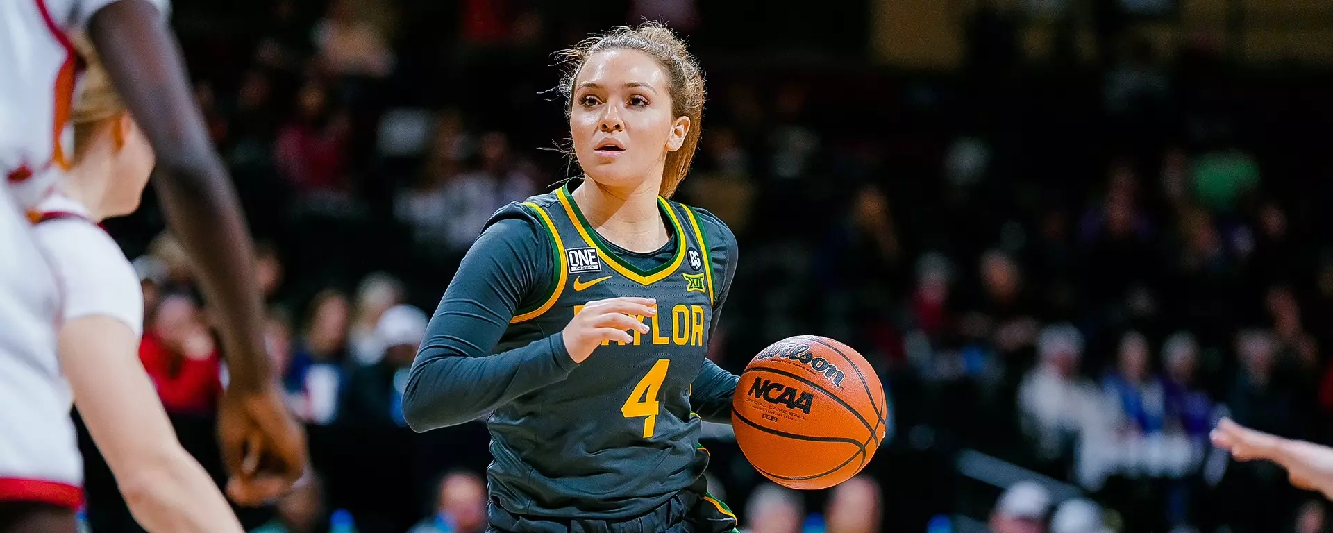 Jana Van Gytenbeek surveys the floor against ISU in the Big 12 Tournament