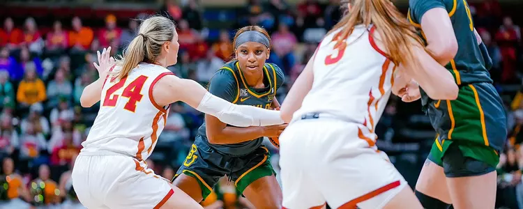 Ja'Mee Asberry dribbles against ISU in the Big 12 Tournament