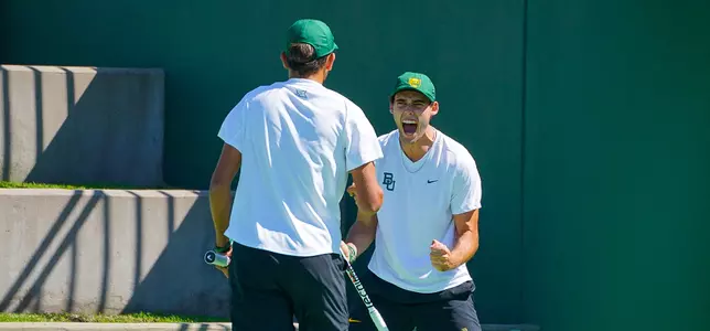 Justin Braverman and Chris Frantzen celebrating a doubles point