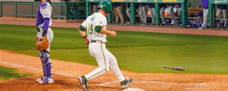 Cortlan Castle scores a run against K-State 2023