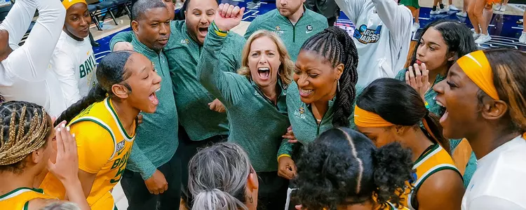 Team celebrates win against Alabama in the NCAA WBB First Rounds