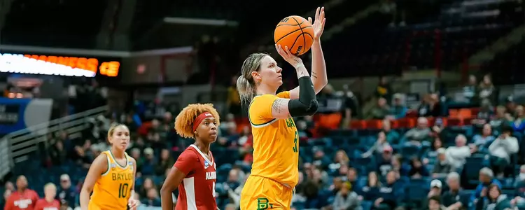 Caitlin Bickle shoots against Alabama in the NCAA WBB First Rounds
