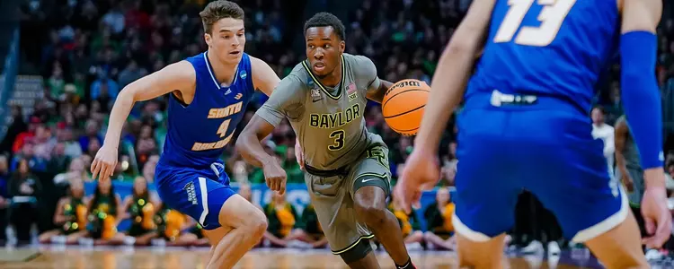 Dale Bonner drives against UCSB in Round One of the NCAA Tournament