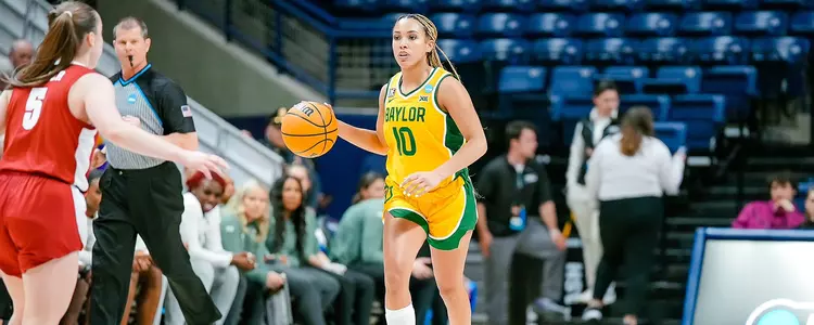 Jaden Owens surveys the court against Alabama in the NCAA WBB First Rounds
