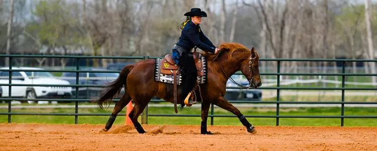Andie Pratt rides against SMU in 2023