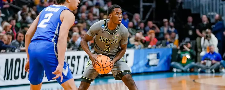 Dale Bonner looks to pass against Creighton in the Second Round of the NCAA Tournament