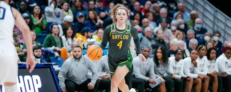 Jana Van Gytenbeek dribbles against UConn in the Second Round of the NCAA Tournament