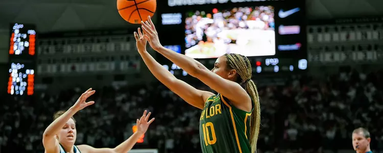 Jaden Owens shoots a three-pointer against UConn in the Second Round of the NCAA Tournament
