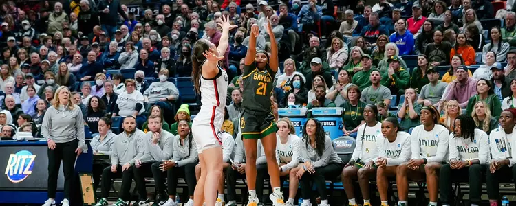 Ja'Mee Asberry shoots a three-pointer against UConn in the Second Round of the NCAA Tournament