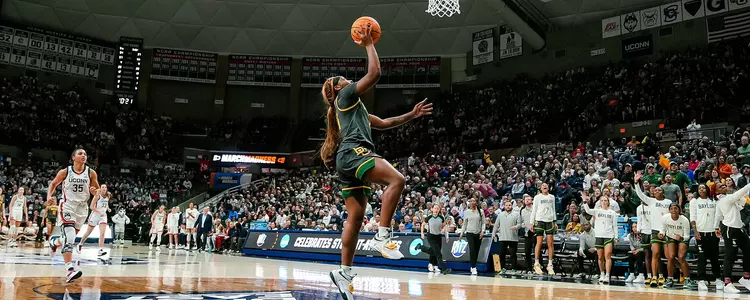 Ja'Mee Asberry gets an uncontested layup against UConn in the Second Round of the NCAA Tournament