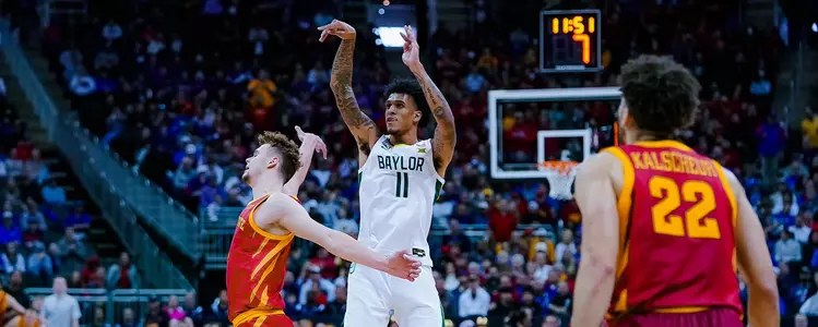Jalen Bridges shoots a three in Big 12 Tournament quarterfinals