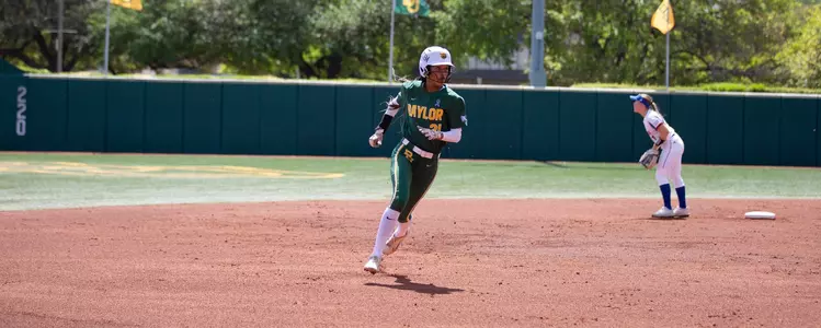 McKenzie Wilson rounds second base agains Kansas at home
