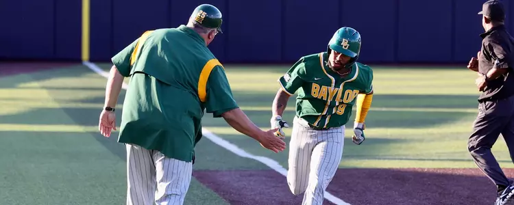 Hunter Simmons rounds the bases after a home run at DBU in 2023