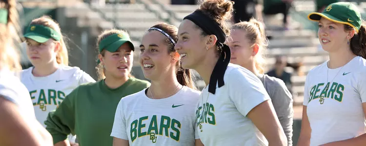 Daniella Dimitrov and Paula Baranano smile before SMU match