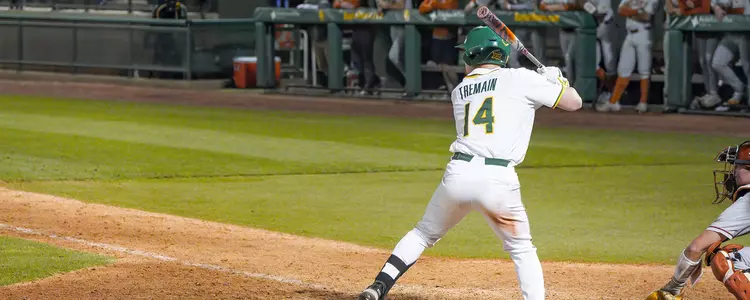 Cole Tremain hitting against Texas in 2023