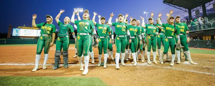BU Softball celebrates on field after win