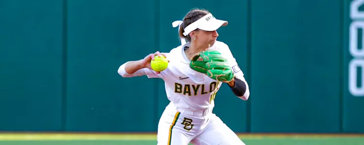 Presleigh Pilon throws the ball from second base