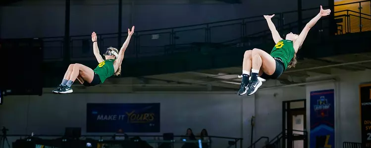 Emily Tobin and Kamryn Kitchens practice their tosses ahead of the NCATA Quarterfinals