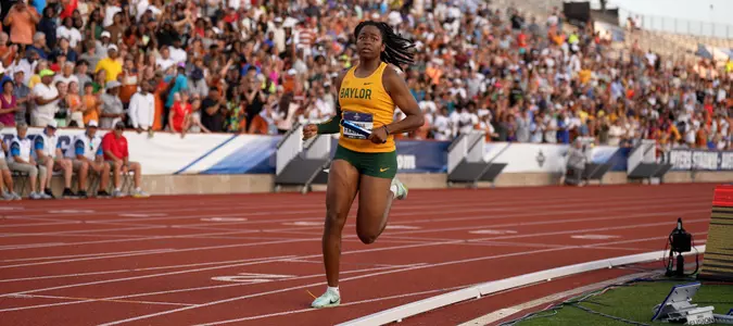 Michaela Francois running the 4x1 at the NCAA Championship finals