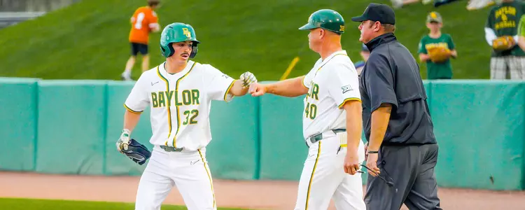 Caleb Bergman and Jim Blair fist bump