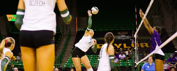 Elise McGhee hits a ball against Stephen F. Austin
