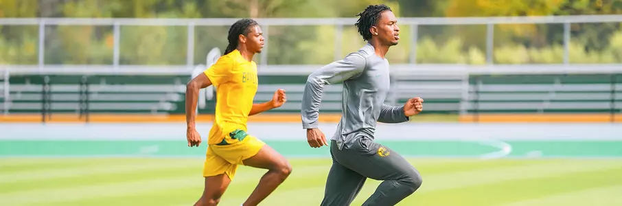 Laurenz Colbert and De'montray Callis running in fall practice 2023