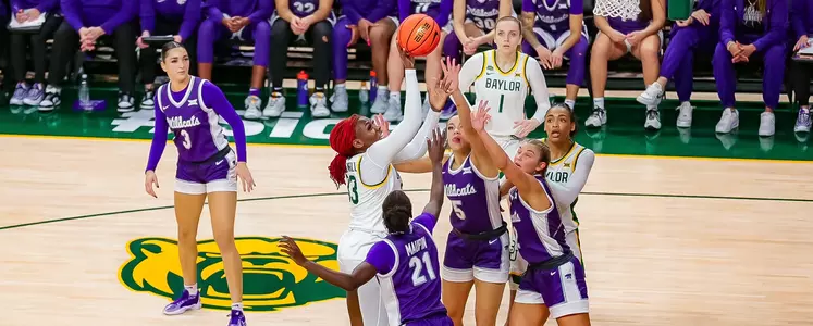 Aijha Blackwell takes a contested shot against KSU