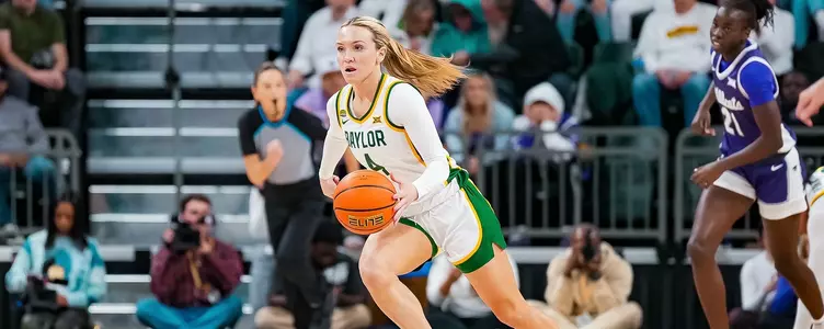 Jana Van Gytenbeek dribbles against Kansas State